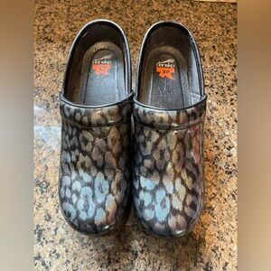 Dansko women’s Multicolor Animal Print clogs, size 41 or 10.5 US size.